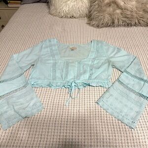Kimchi Blue UO Blue Eyelet
Lace Long Sleeve Crop Semi
Sheer size Large